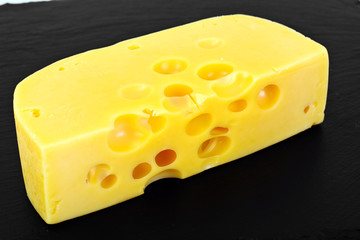 Swiss Cheese on Black Background
