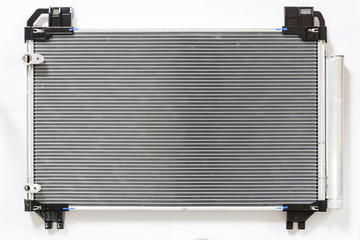 Car condenser radiator on white background. Radiator top view of