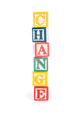 photo of a alphabet blocks spelling CHANGE isolate on white back