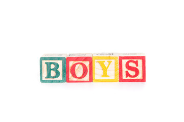 BOYS with colorful alphabet blocks on white background