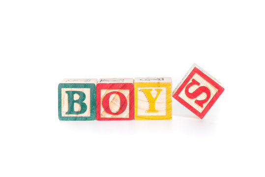 BOYS with colorful alphabet blocks on white background