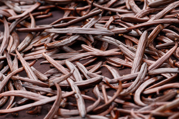 Vanilla dry fruit (vanilla bean, pod)  in the curing ferments process for grading vanilla flavor.