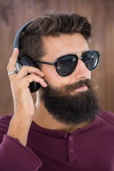 Hipster man listening music
