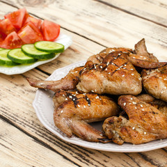 Chicken wings grilled on the plate