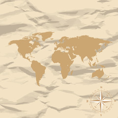 World Map on old vintage retro background with compass