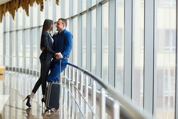 Couple in love on vacation. Couple standing in the airport.