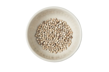 Isolated bowl of white dried pepper on a white background