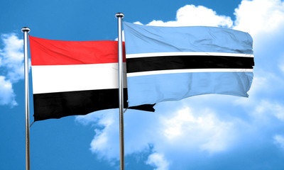 Yemen flag with Botswana flag, 3D rendering