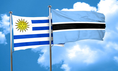Uruguay flag with Botswana flag, 3D rendering