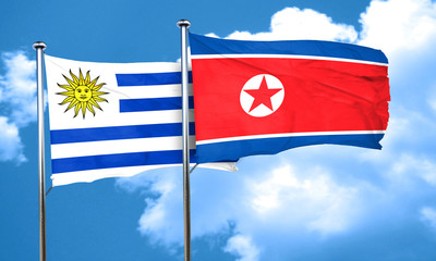 Uruguay flag with North Korea flag, 3D rendering