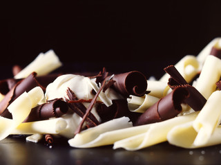 White, dark and milk chocolate curls