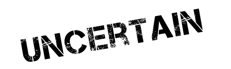 Uncertain black rubber stamp on white