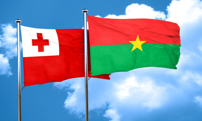 Tonga flag with Burkina Faso flag, 3D rendering