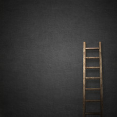black stucco wall, ladder near the wall background