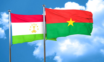 Tajikistan flag with Burkina Faso flag, 3D rendering