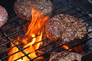 Meat burgers for hamburger grilled on flame grill - obrazy, fototapety, plakaty