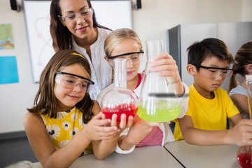 Close up view of pupils doing science
