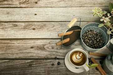 Cup of coffee with coffee bean and cinnamon