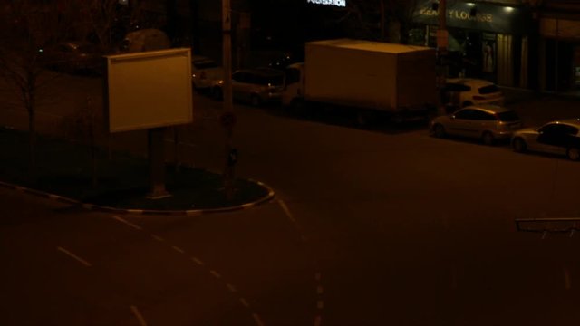 Night Traffic On A Street Late At Night, Aerial View, Pan