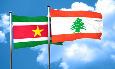 Suriname flag with Lebanon flag, 3D rendering