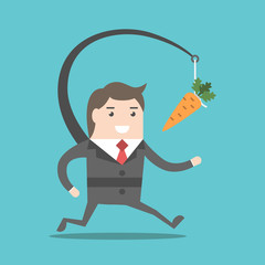 Businessman chasing carrot