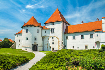 Fototapeta na wymiar City park and old castle in Varazdin, Croatia, originally built in the 13th century 