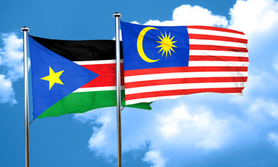 south sudan flag with Malaysia flag, 3D rendering