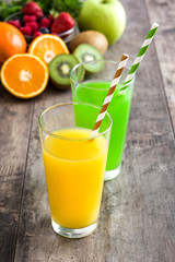 Fresh fruit smoothies on a rustic wooden table

