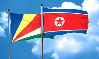 seychelles flag with North Korea flag, 3D rendering