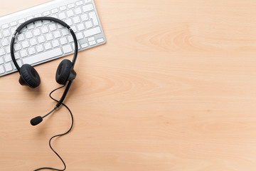 Office desk with headset. Call center support