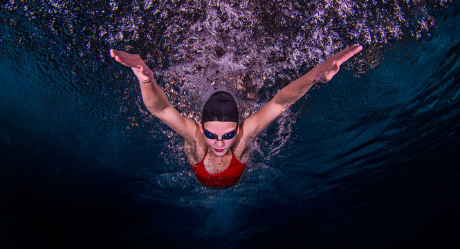 Swimmer performing butterfly stroke