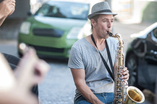Street musician playing saxophone
