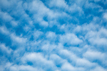 cloudy wave with sun shines blue sky