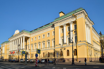 Fototapeta na wymiar Hotel 4 seasons with flags clear day in summer in Saint-Petersbu