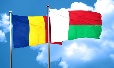 Romania flag with Madagascar flag, 3D rendering