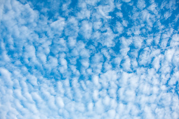 cloudy wave with sun shines blue sky