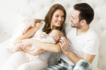 Happy family with newborn baby