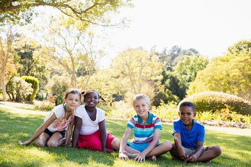 Kids posing together during a sunny day at camera