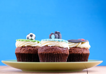 Delicious cupcakes on table