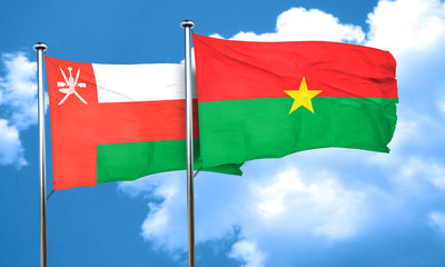 Oman flag with Burkina Faso flag, 3D rendering