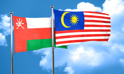 Oman flag with Malaysia flag, 3D rendering