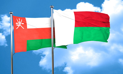 Oman flag with Madagascar flag, 3D rendering