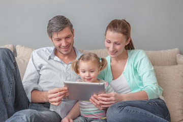 couple with children  reader watching