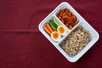 Food series : Spicy chicken and tomato dip, served with brown rice and fresh vegetable, Thai foods, northern style