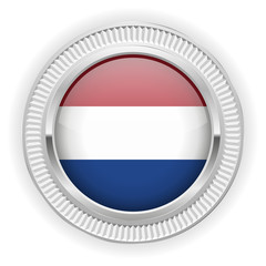 Runder Button mit niederländische Flagge und silber Rand