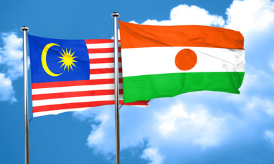 Malaysia flag with Niger flag, 3D rendering