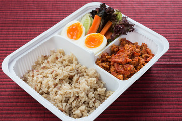 Food series : Spicy chicken and tomato dip, served with brown rice and fresh vegetable , Thai foods, northern style
