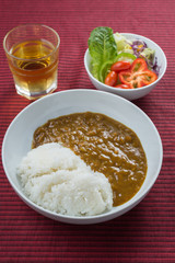 Food series : Vegetarian curry rice with salad and apple juice