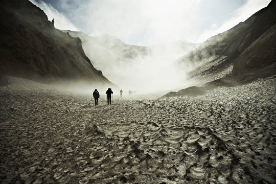 Hikers trekking through the Mutnovsky Volcano
