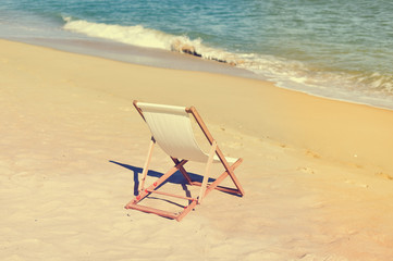 Beautiful beach landscape with chair for relaxation. Travel background